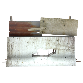 Damaged concrete guardrail